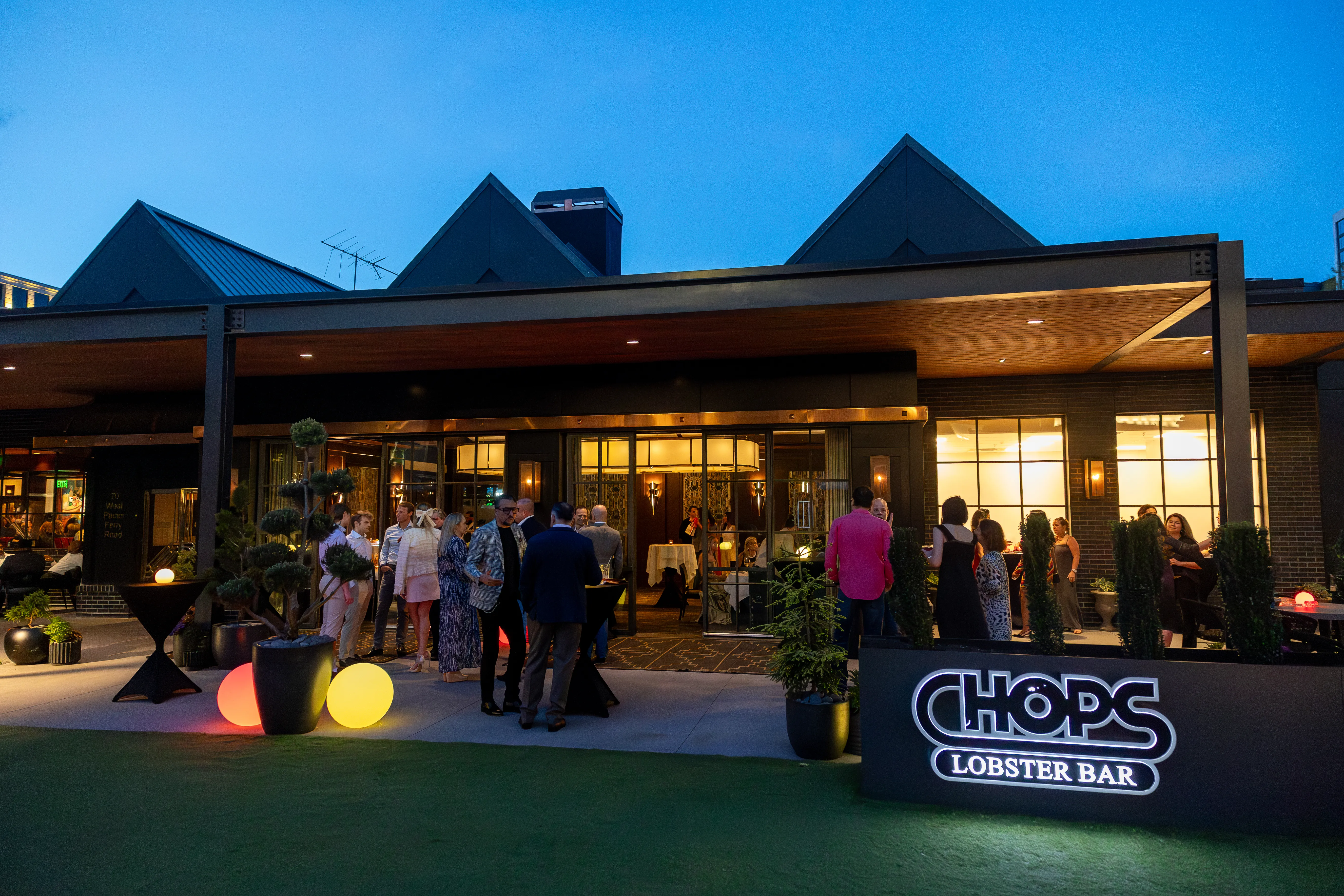 Cocktail reception on the patio at Chops Lobster Bar, Buckhead Atlanta